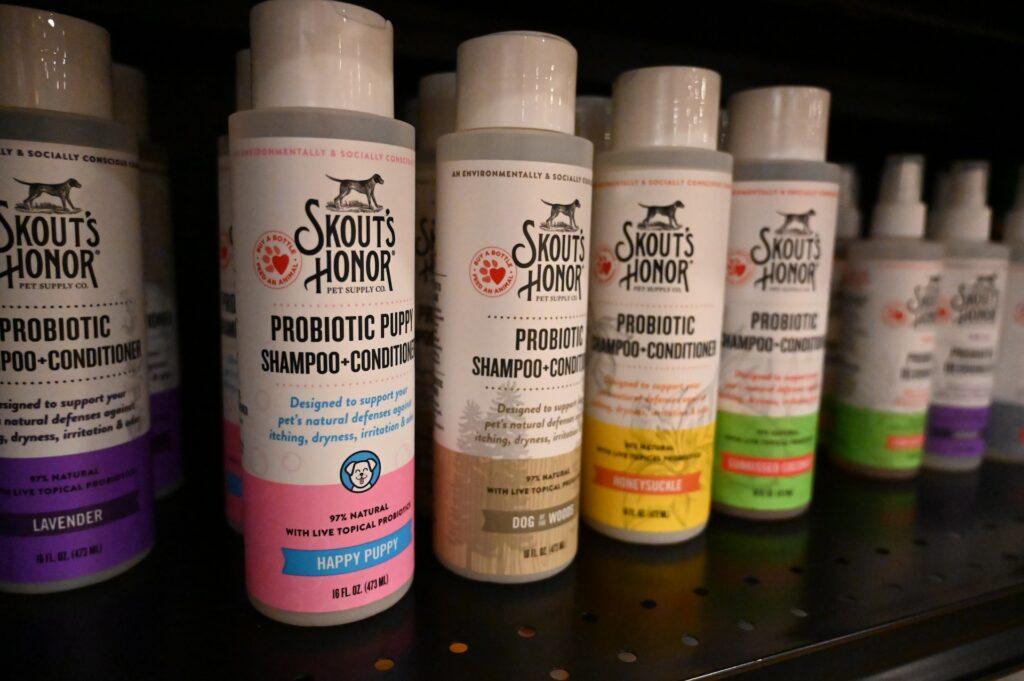 a row of pet shampoo bottles